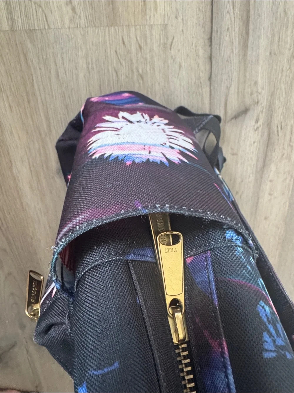 Herschel Supply Company Black Backpack with Blue and Pink Floral Accents